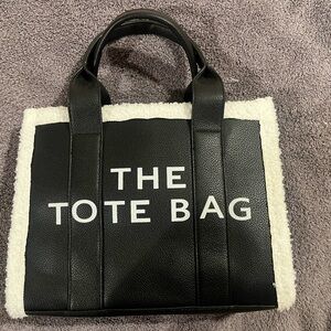 Black tote bag with faux fur trim